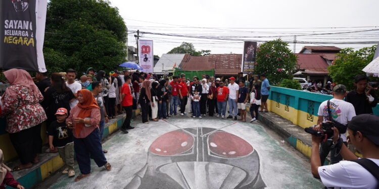 Warga di Kota Binjai Lukis Superhero Kamen Rider di Jembatan Mencirim, Ini Alasannya