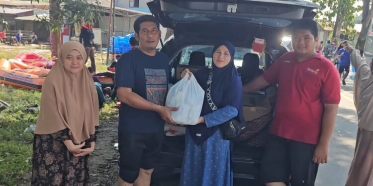 Pemuda Muhammadiyah Cabang Tanjung Pura Terima Bantuan dari Grup SHAUM Jakarta